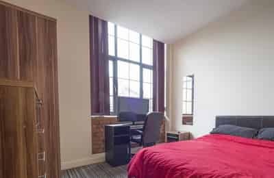 Room?w=400&h=260&fit=crop&q=40&auto=format&trim=auto
