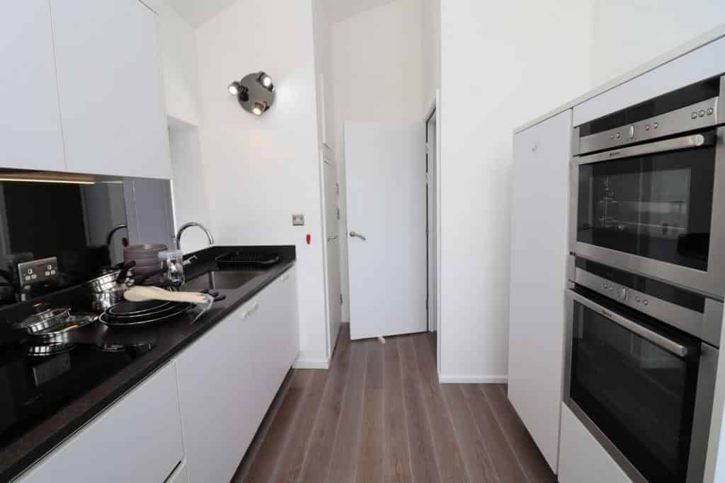 Room in a 4 Bedroom Apartment, St George Wharf, London SW8 2LE - London, England, United Kingdom - Kitchen